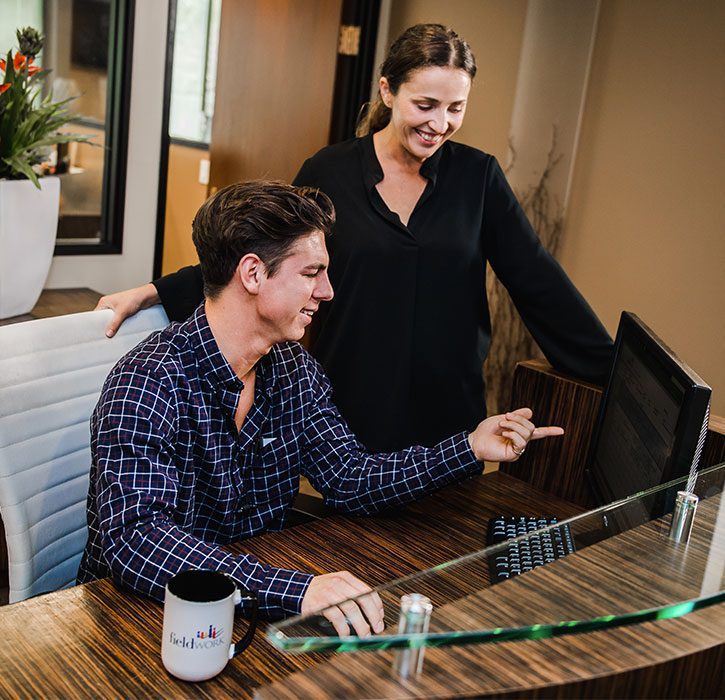 Man Pointing At Computer